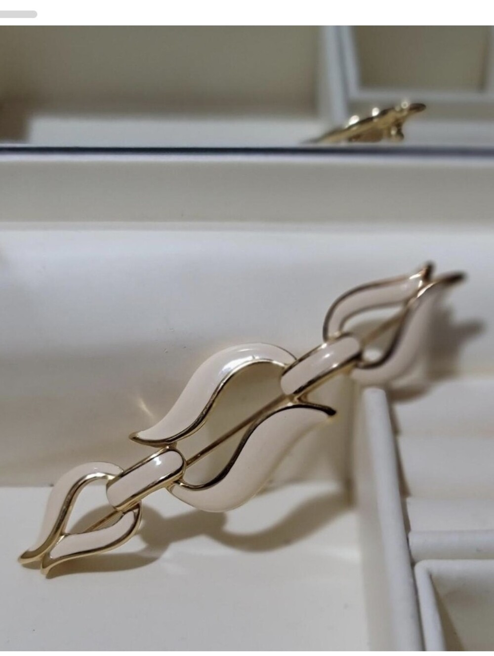 Monet Gold-Tone and Cream Enamel Wave-Link Brooch